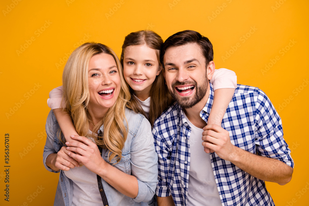 Photo wife beautiful mother lady husband dad guy couple carry little school girl daughter piggyback happy together play weekend laughing wear casual clothes isolated yellow color background Stock Photo Adobe Stock hq pic