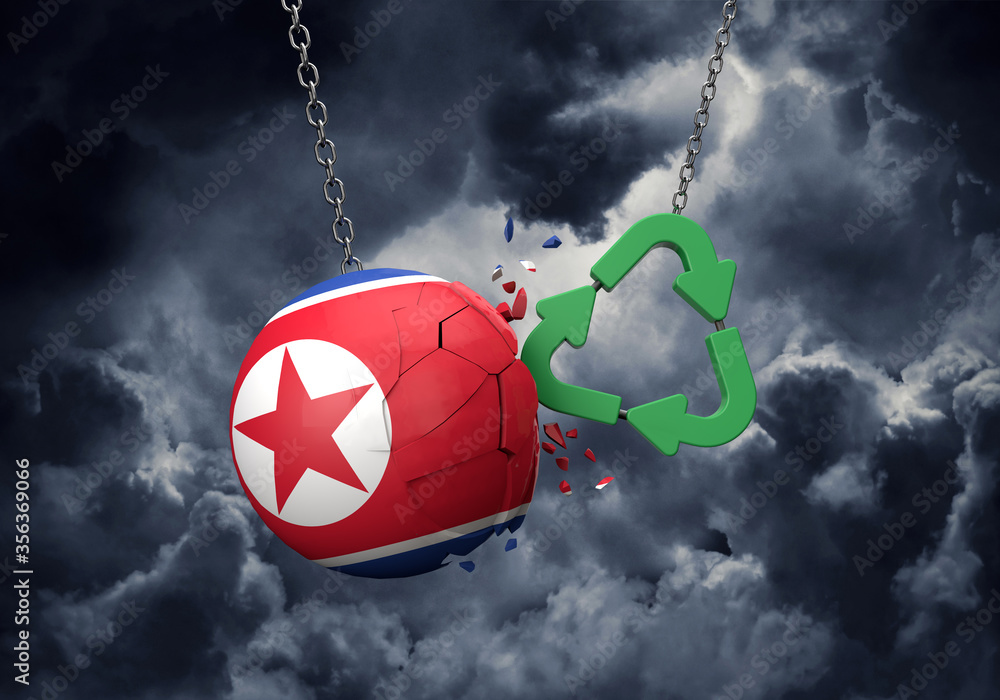 Obraz premium Green recycle symbol crashing into a North Korea flag ball. 3D Rendering