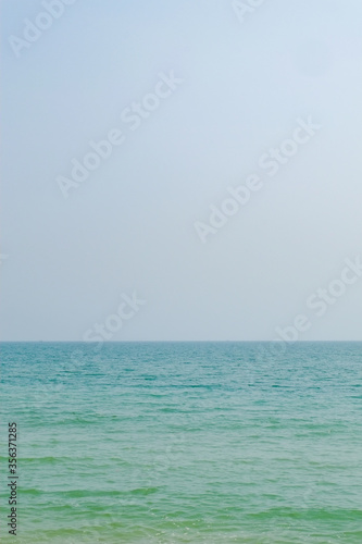 View of the ocean with many color shade of the sea. © bankstocker