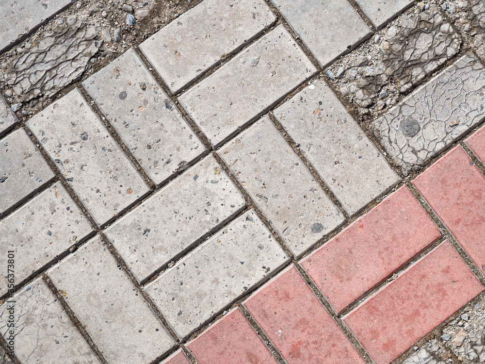 Background image of texture of pedestrian footpath covered by paving tiles Background image of texture of pedestrian footpath covered by paving tiles