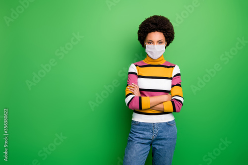 Portrait of her she nice attractive wavy-haired business lady wearing gauze mask folded arms stop cov ncov mers preventive measures respiratory infection isolated green color background