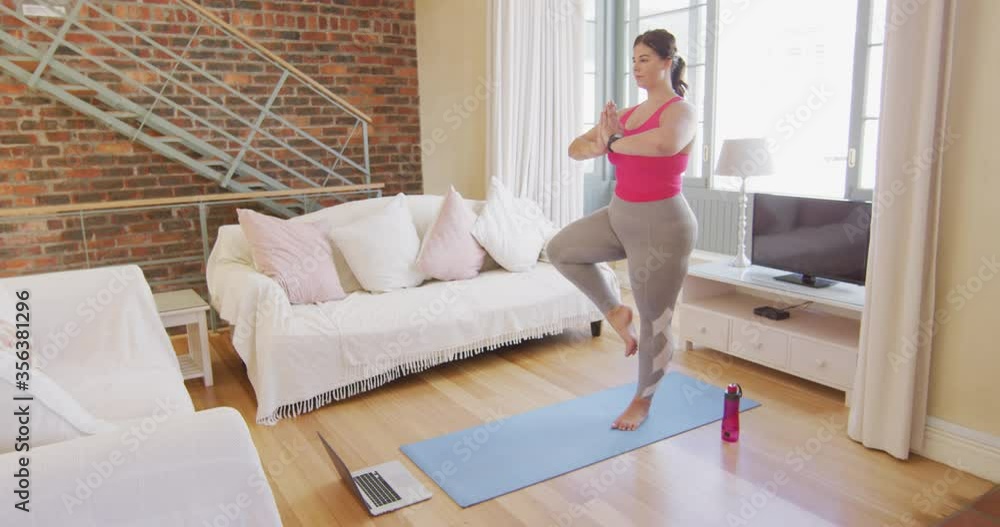 Caucasian vlogger female exercising at home Caucasian vlogger female exercising at home