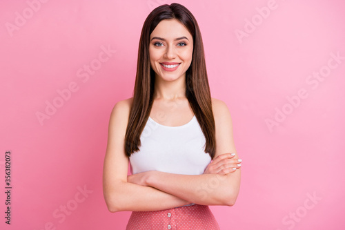 Portrait of her she nice attractive lovely pretty cute charming content cheerful cheery straight-haired girl freelancer folded arms isolated over pink pastel color background