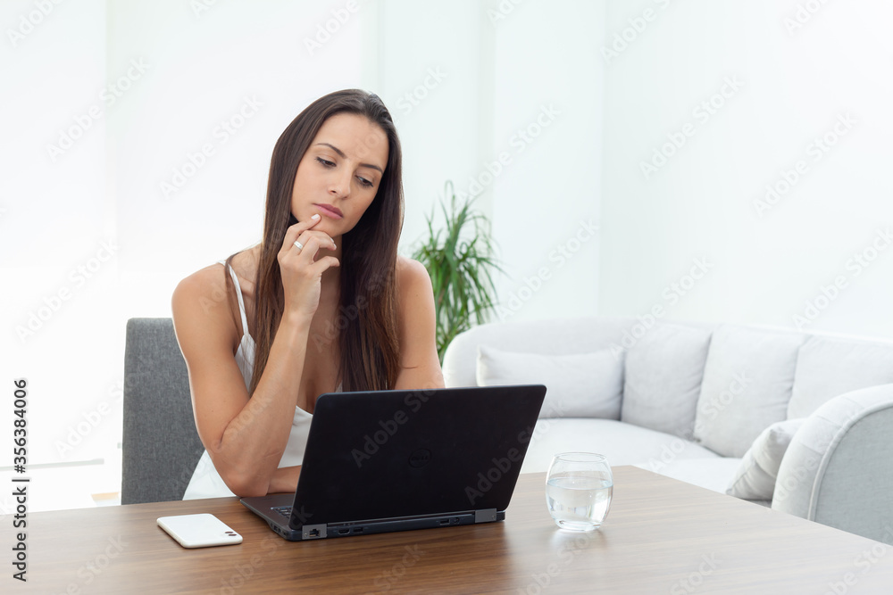 Young businesswoman working from home Young businesswoman working from home