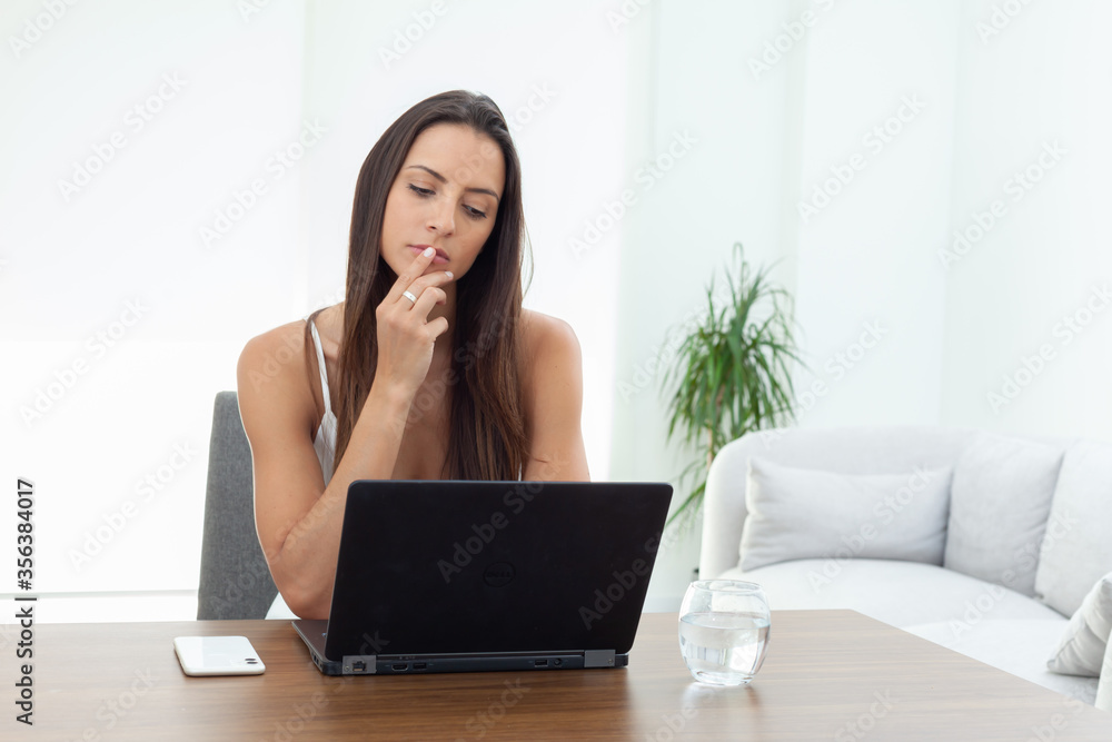 Young businesswoman working from home Young businesswoman working from home