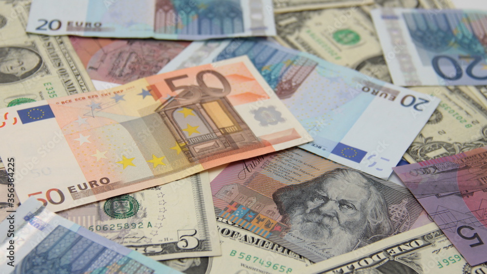 Close up of background from international paper money. Close up of background from international paper money.
