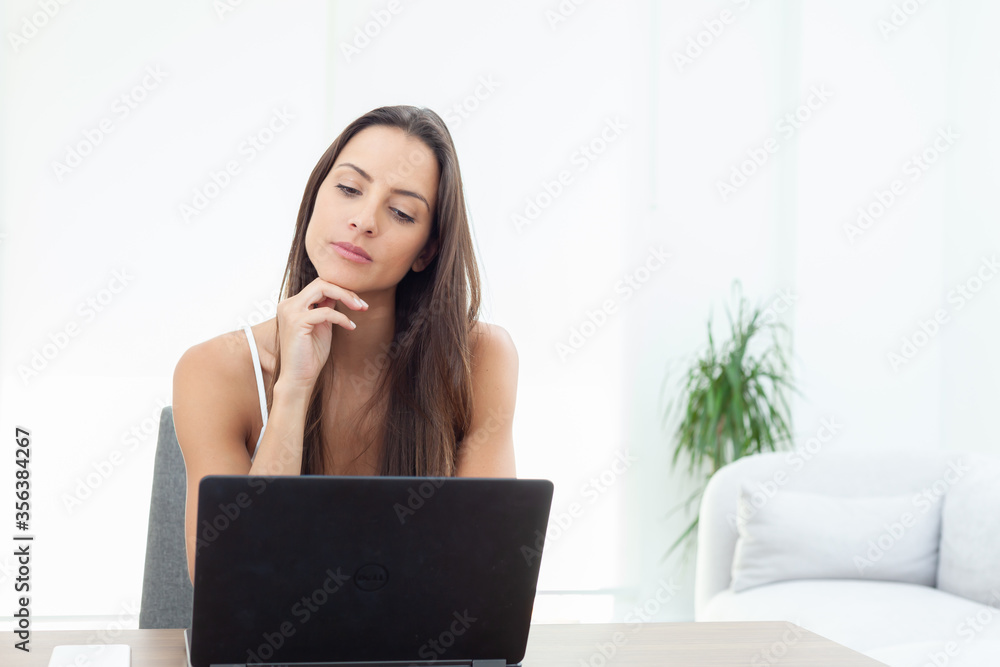 Young businesswoman working from home Young businesswoman working from home