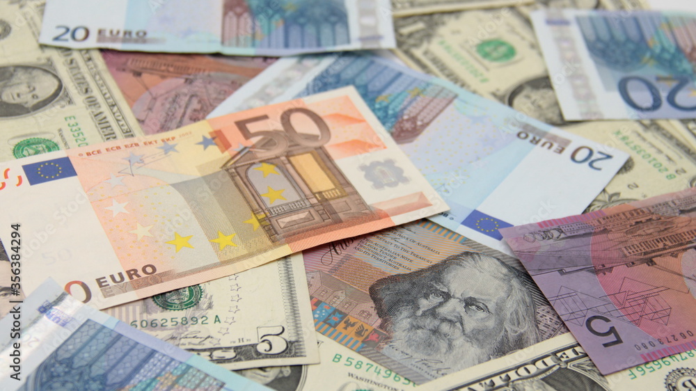 Close up of background from international paper money. Close up of background from international paper money.