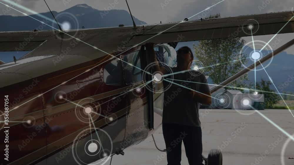 Animation of global network of connections with aeroplane in background Animation of global network of connections with aeroplane in background