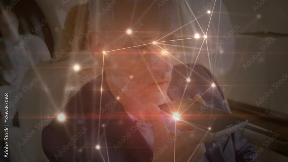 Animation of global network of connections with business man on phone Animation of global network of connections with business man on phone
