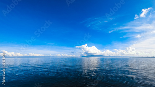 bright blue sky and calm sea