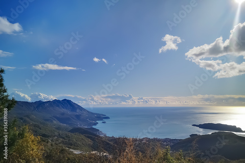 Scenic landscape with Adriatic sea and Montenegro nature on blue sky background catched in sunny day