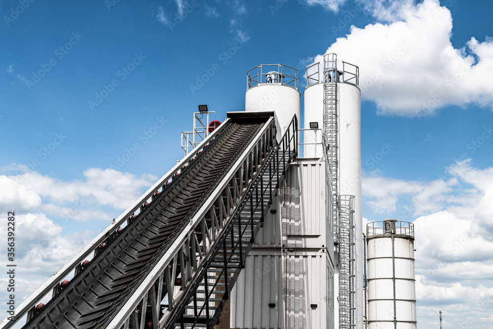 belt conveyor - transport of raw material on the production line - clean factory