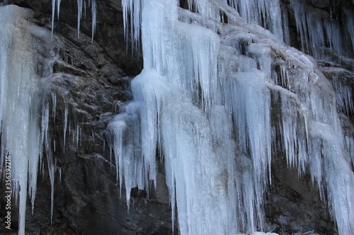 Frozen water, waterfall. Ice. Frost. Winter.