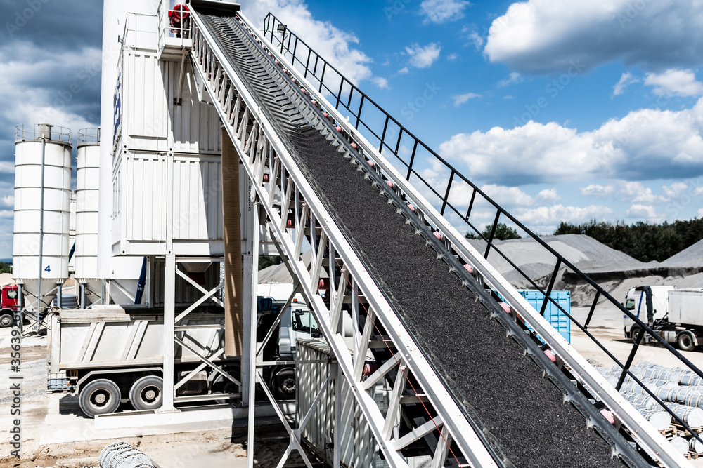 belt conveyor - transport of raw material on the production line - clean factory