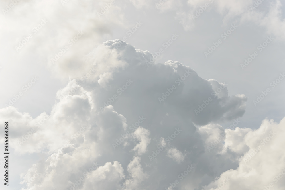 White big fluffy clouds. Natural scenic abstract background. Weather changes backdrop. Sky filled with voluminous clouds. White big fluffy clouds. Natural scenic abstract background. Weather changes backdrop. Sky filled with voluminous clouds.