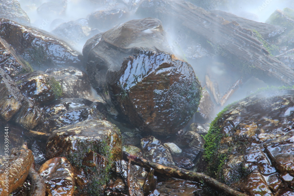 Close up of river and small rapids, wild water, dangerous nature.