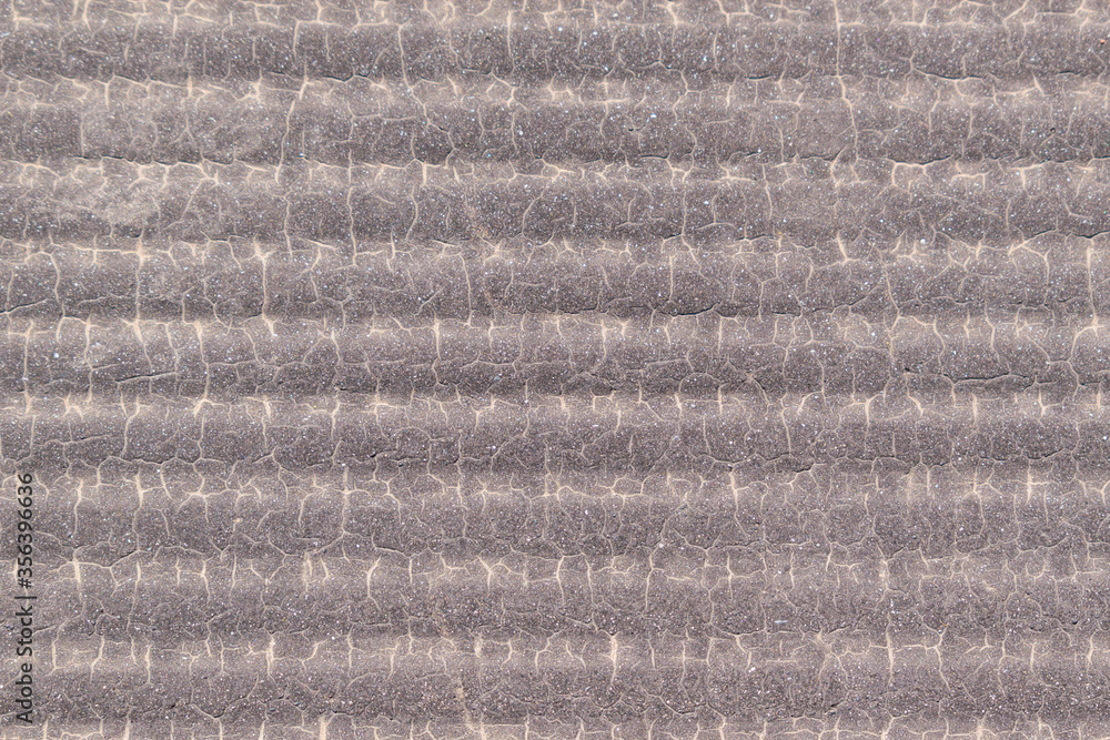 Fototapeta premium Wavy surface for backdrop. Horizontal stripes, creases and cracks with an abstract pattern. Color - Taupe Gray, Blanc, Hue Yellow.