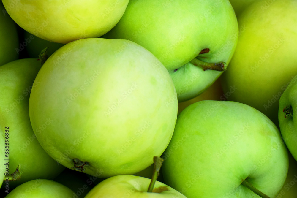 Fresh green apple harvest background Fresh green apple harvest background
