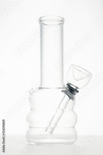 glass water bong pipe for smoking marijuana in white studio