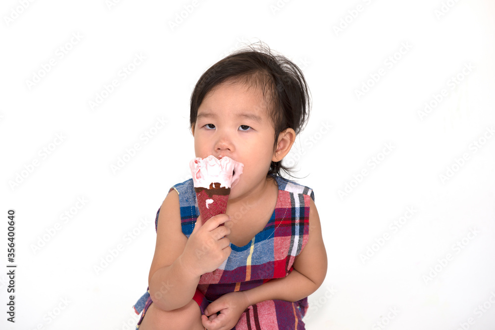 little girl eating ice cream isolated on white little girl eating ice cream isolated on white