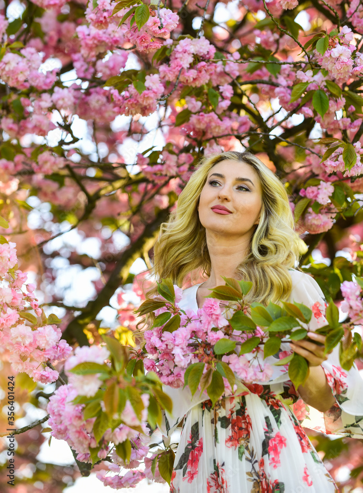 Girl enjoy sakura in garden. Cherry tree. Good vibes. Floral aroma. Harmony and female energy. Spring blossoming tree. Spring symbol. Reasons why flowers always make women happy. Happy spring day Girl enjoy sakura in garden. Cherry tree. Good vibes. Floral aroma. Harmony and female energy. Spring blossoming tree. Spring symbol. Reasons why flowers always make women happy. Happy spring day