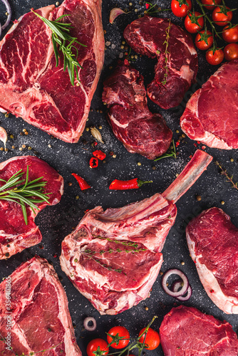 Bild auf Leinwand Set of various classic, alternative raw meat, veal beef steaks - chateau mignon, t-bone, tomahawk, striploin, tenderloin, new york steak