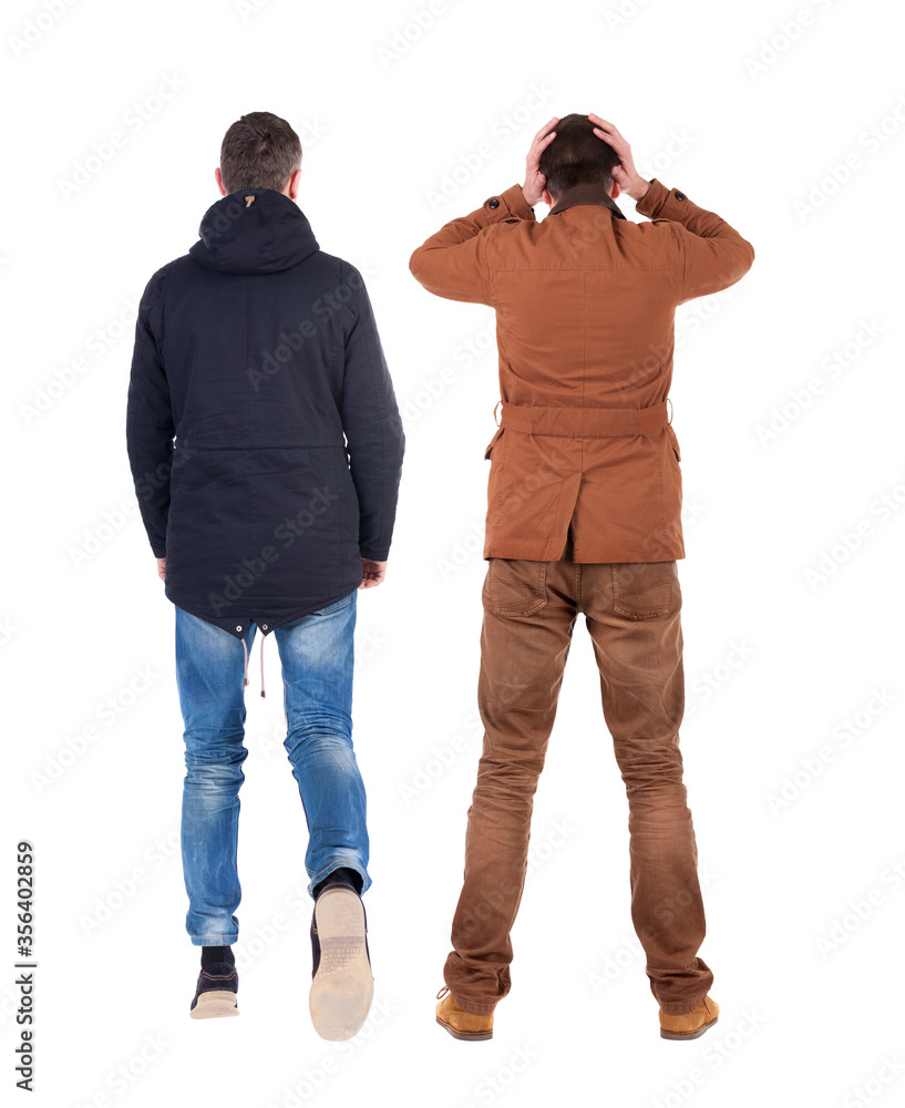 Back view of couple in winter jacket. Back view of couple in winter jacket.
