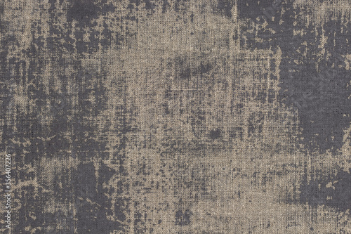 Rustic background with canvas texture with with spots of gray paint