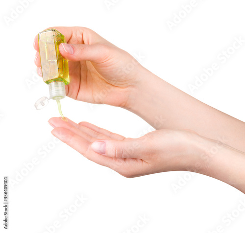 Woman hands use antibacterial gel. Concept of protection from Covid-19