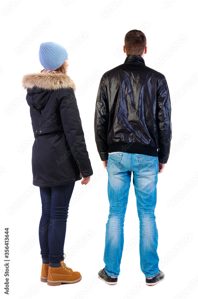Back view of couple in winter jacket. Back view of couple in winter jacket.
