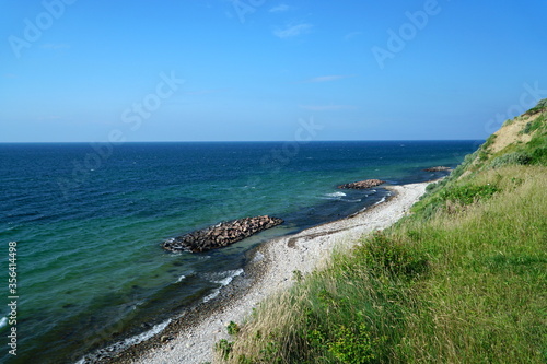 The nice beach in the city of Hundested on a sunny day, Denmark. photo