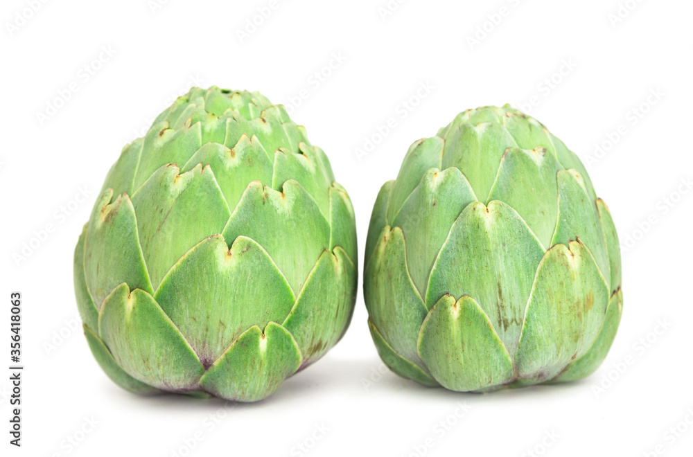 Fototapeta premium two ripe artichokes on white background