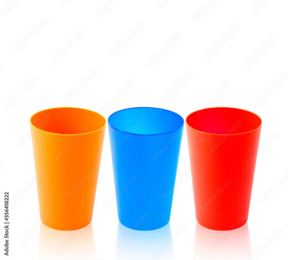 colorful plastic mug isolated on white background colorful plastic mug isolated on white background