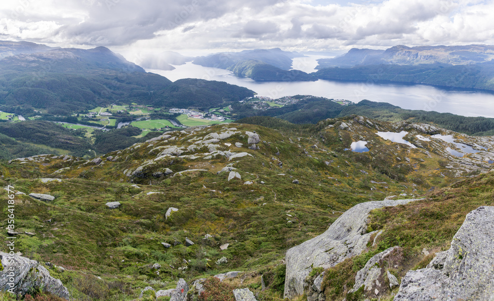 Fototapeta premium View from Hellandsnuten Mountain to town of Sand and five Fjords. Sandsfjord, Hylsfjord, Saudafjord, Vindafjord and Lovrafjord. Norway.