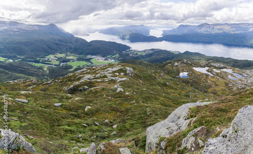 View from Hellandsnuten Mountain to town of Sand and five Fjords. Sandsfjord, Hylsfjord, Saudafjord, Vindafjord and Lovrafjord. Norway.