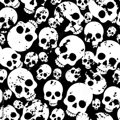 Seamless pattern with skulls on black background.