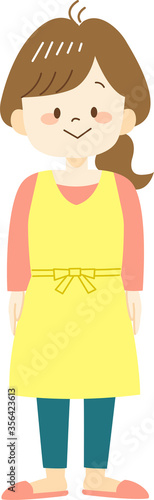 Young woman in yellow apron