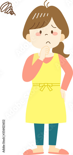 Thinking young woman in yellow apron