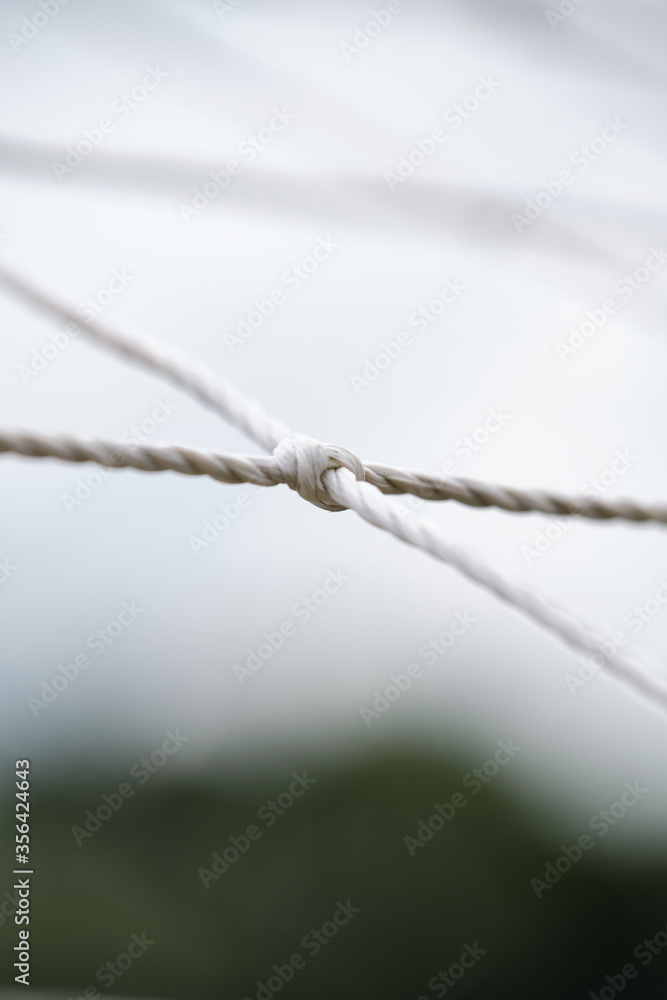 close up of a football net close up of a football net