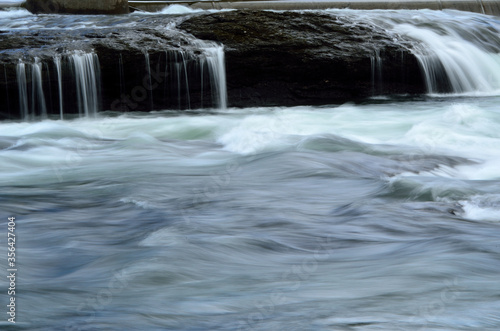 beautiful massive river flow and waterfalls in summer nature