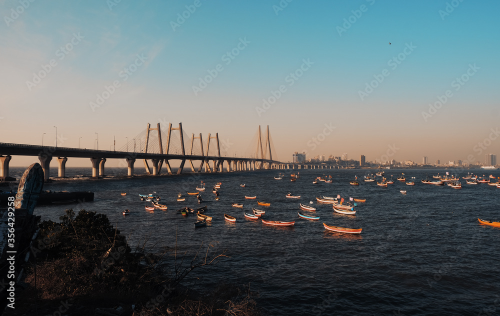 Fishing Boats at worli Fort - Background the Bandra-Worli Sealink bridge, Mumbai City, Beautiful Sunset