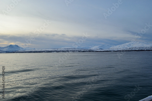 blue snowy mountain and fjord landscape