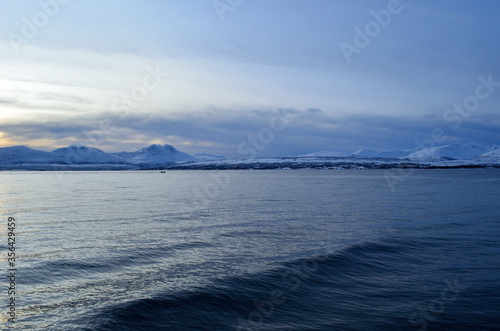 blue snowy mountain and fjord landscape