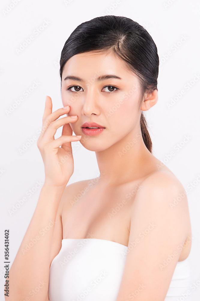 Beautiful Young asian Woman touching her clean face with fresh Healthy Skin, isolated on white background, Beauty Cosmetics and Facial treatment Concept. Beautiful Young asian Woman touching her clean face with fresh Healthy Skin, isolated on white background, Beauty Cosmetics and Facial treatment Concept.