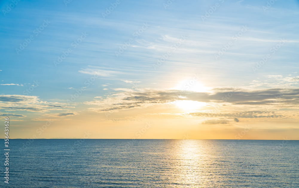 Fototapeta premium sunset over the sea in the evening