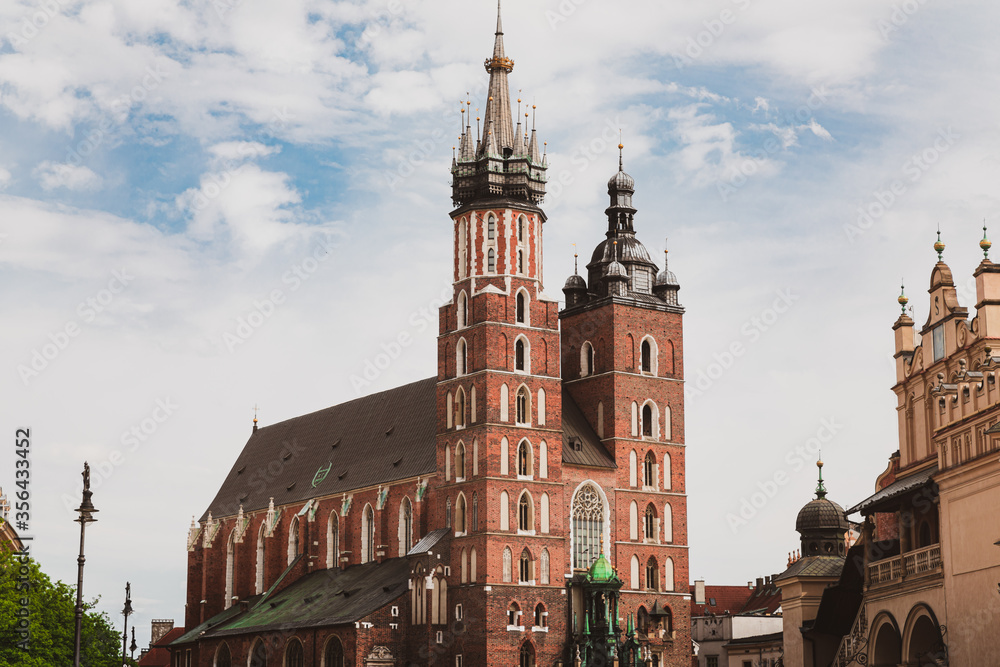 St. Mary's Church in Cracow Poland against the backgriund of a cloudy sky