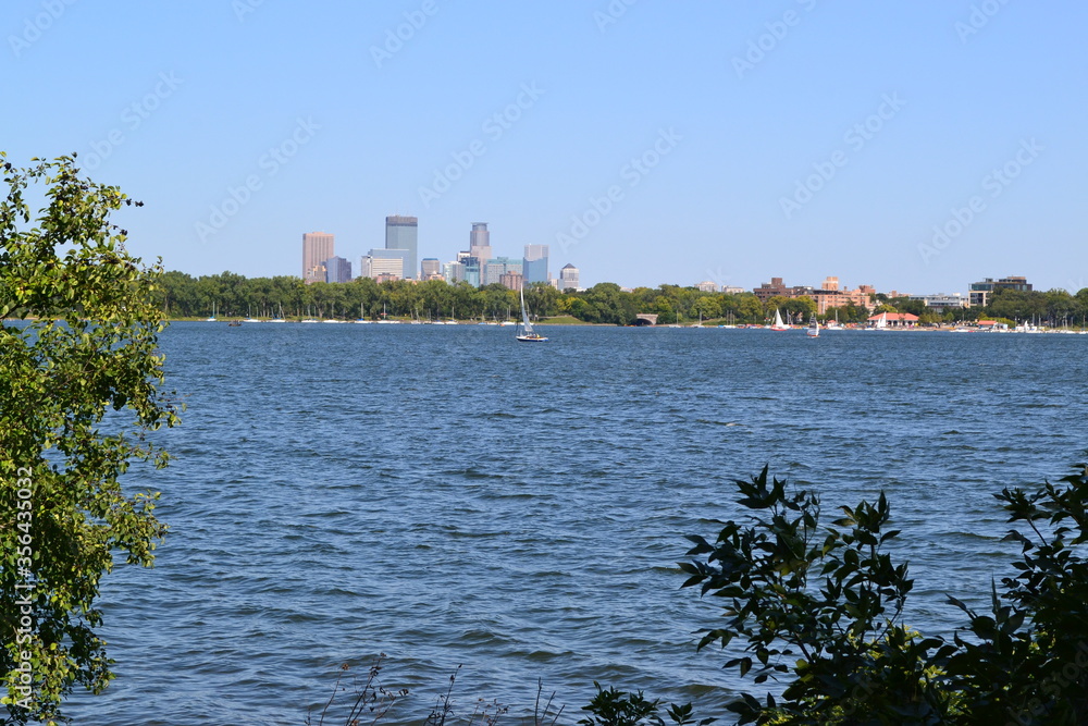 Scenic View of Downtown Minneapolis, Minnesota With Lake Calhoun and Sail Boats in Foreground