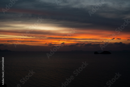 Beautiful red sunset over the ocean or sea. © Volodymyr
