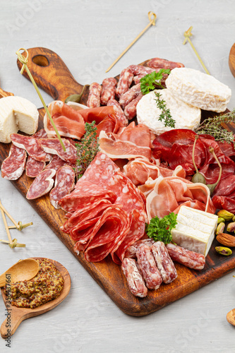 Valokuva Appetizers table with differents antipasti, charcuterie, snacks and wine
